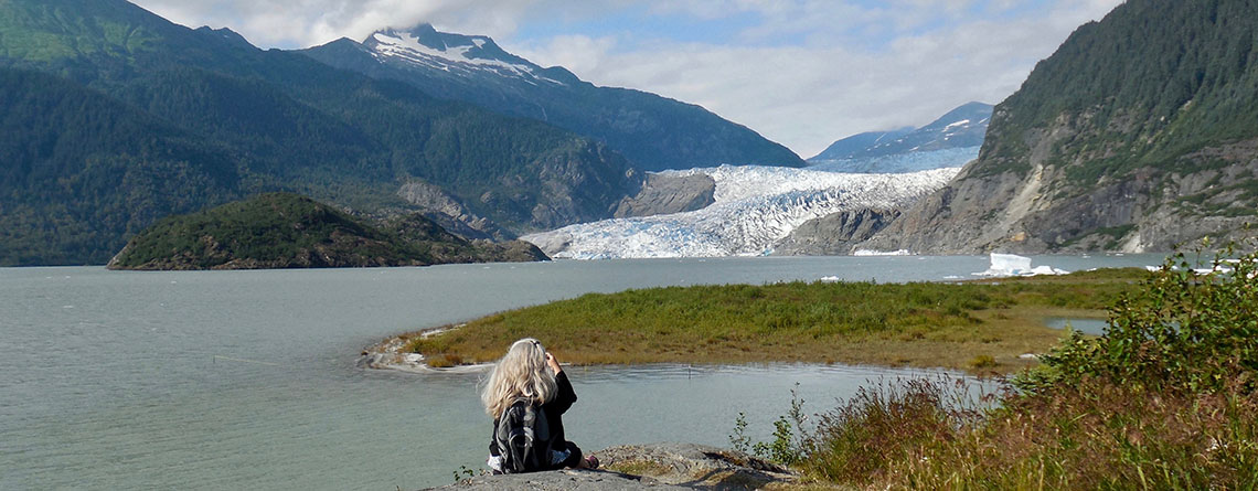 Karen L Nelson visiting the Mendenhall Glacier in Juneau, Alaska.